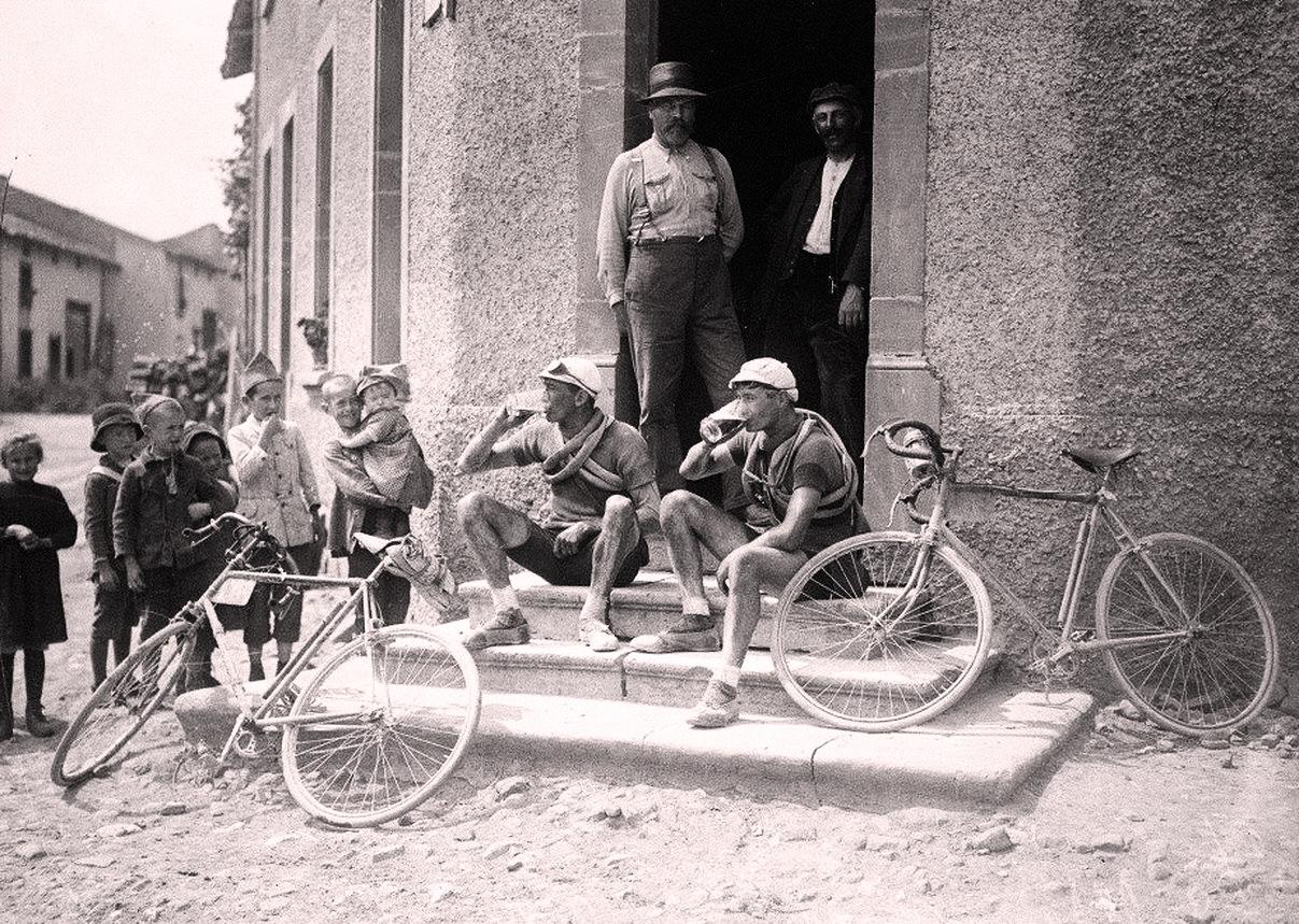 Beer drinking cyclists having a litle break at Tour de Framce 1921