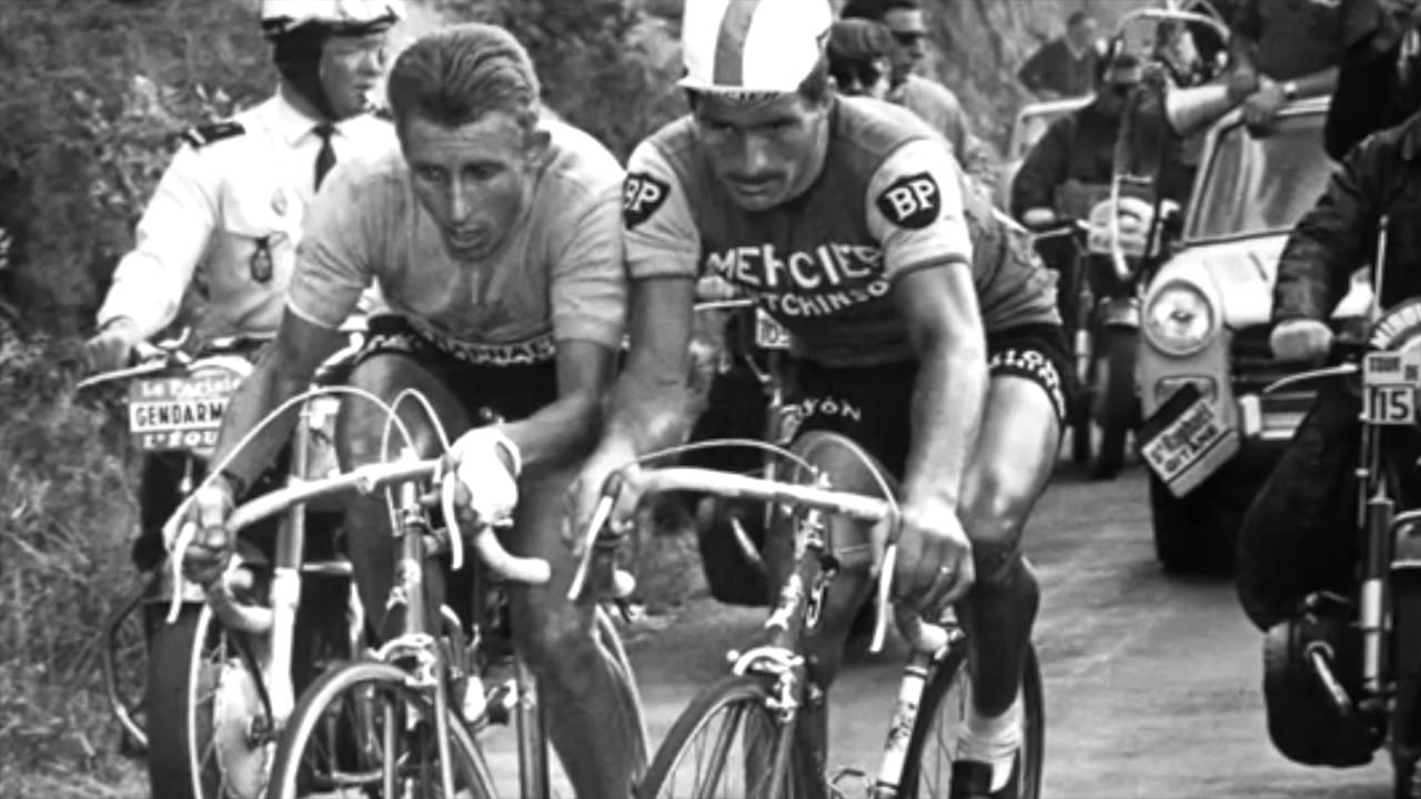 Jacques Anquetil and Raymond Poulidor are figting shoulder to shoulder on the famous Tour de France ascent Puy de Dôme. 