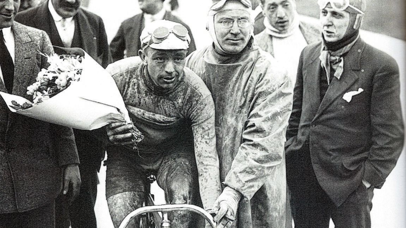 The first Tour of Flanders 1913 and the first winner of the rsce Paup Deman, who is sitting in the saddle of his bicycle