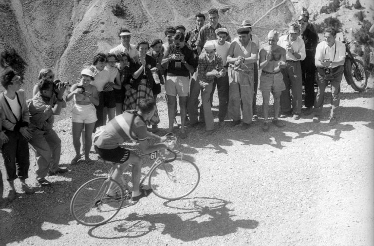 Fausto Coppi alongside the road on the Col d'Izoard in 1953. The stage was won by Louison Bobet