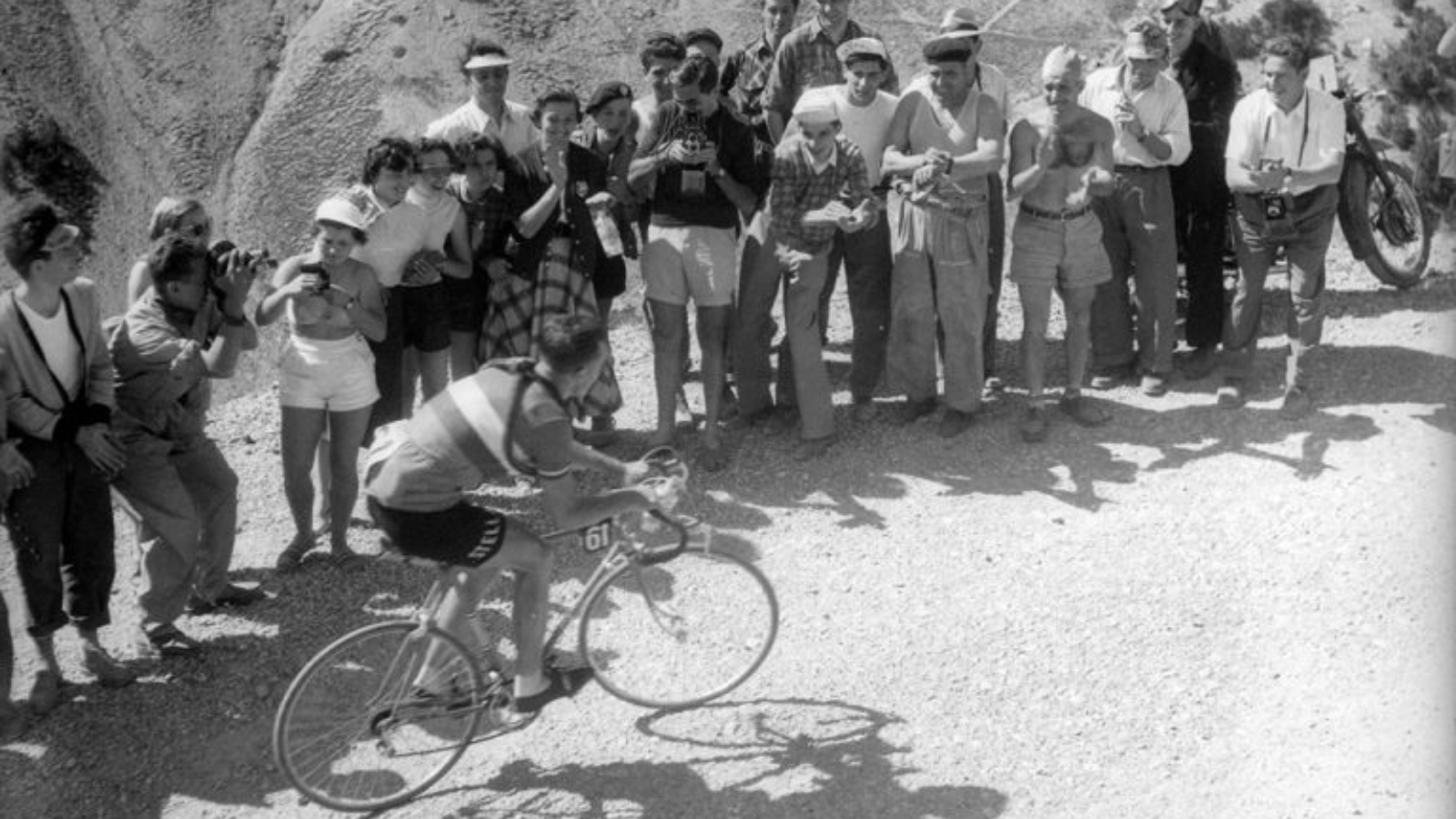 The tourist Fausto Coppi filming Louison Bobrt on the Col d'Izoard at the Tour de France 1953