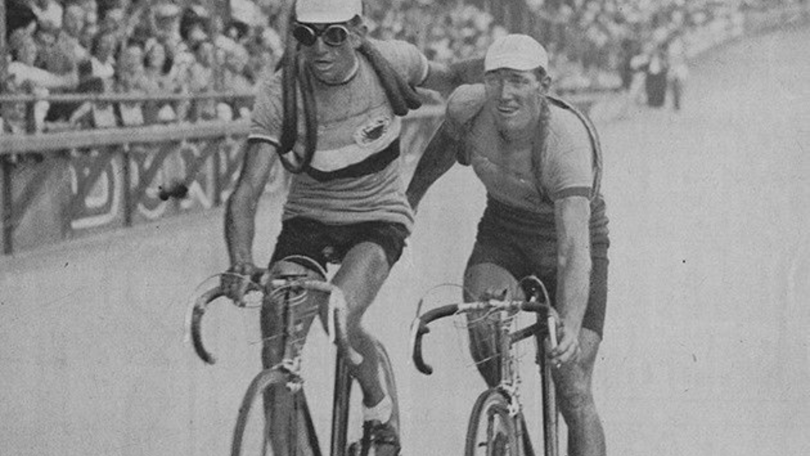 Cyclists crossing the finish line together on the last stage of Tour de France 1938