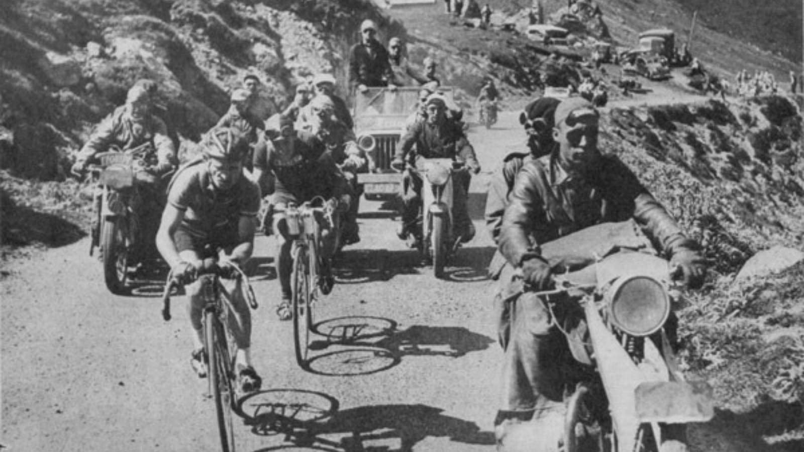 French cyclist Jean Robic, winner of Tour de France 1947 riding at the front on the group of cyclists