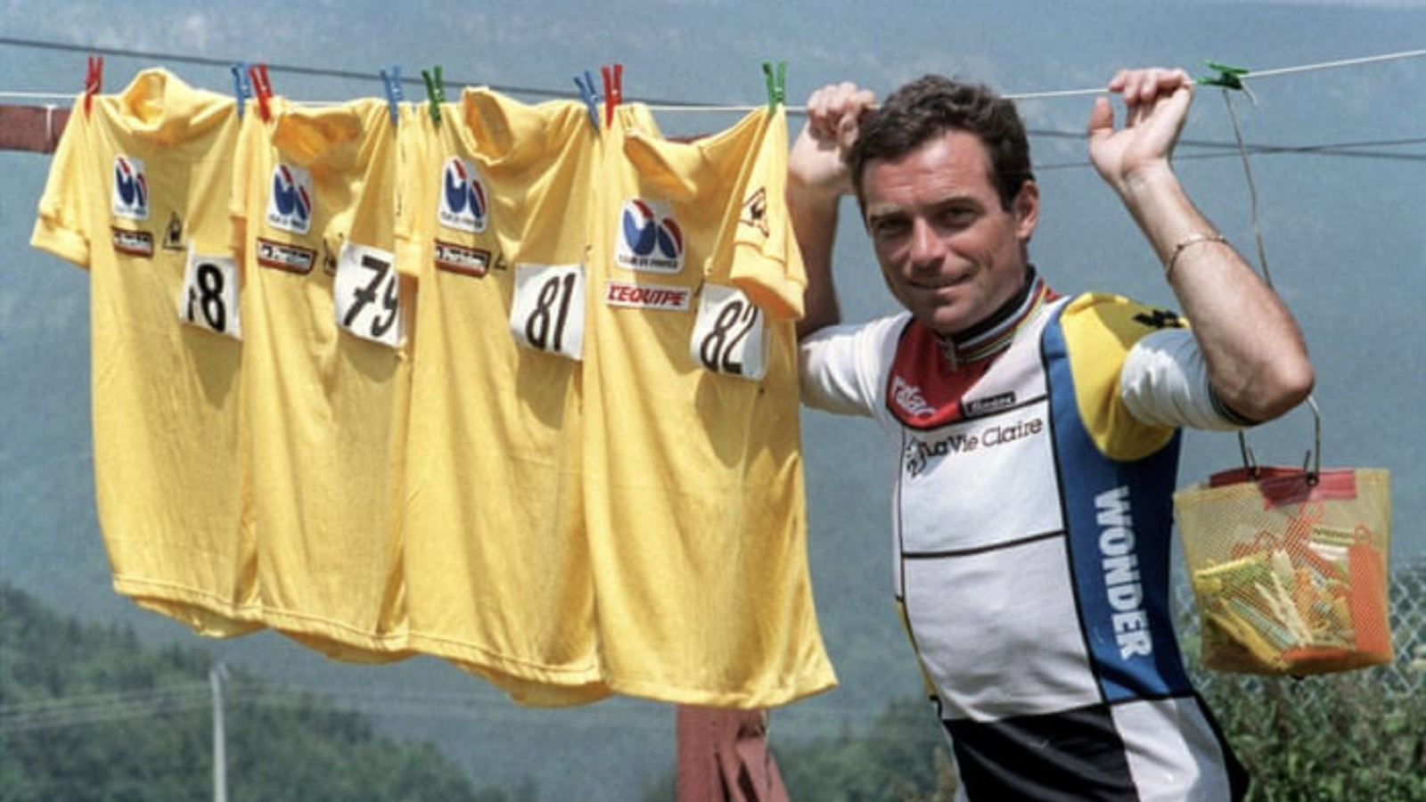 French cyclist Bernard Hinault and some yellow jerseys.