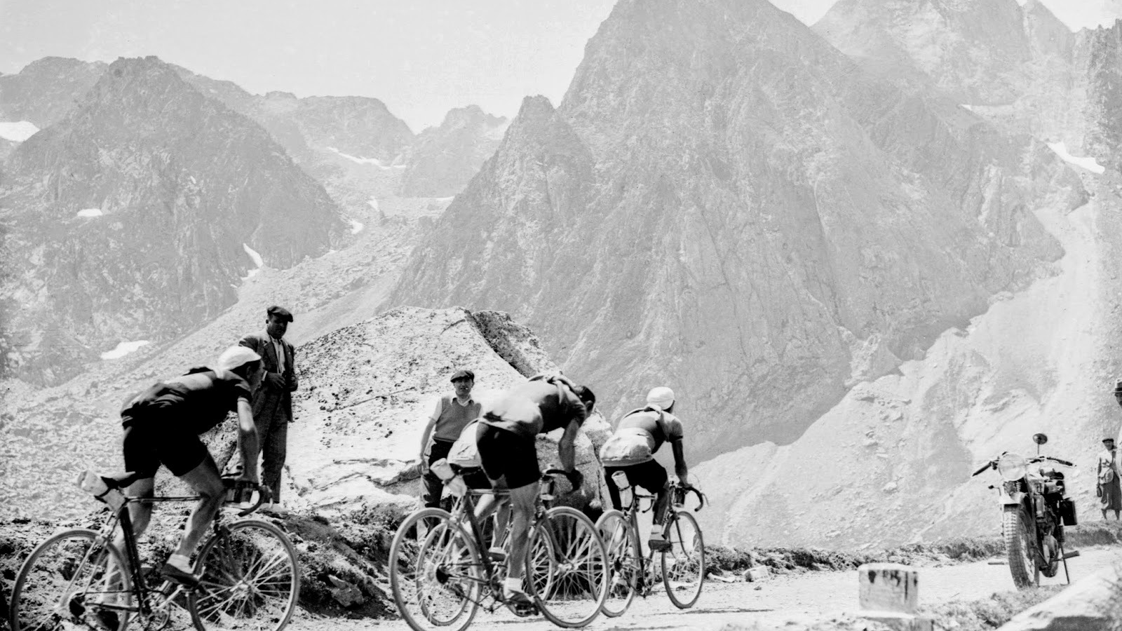 Iconic image about road cycling races in the hight mountains: cyclists climbing the mighty Tourmalet at Tour de France 1937.