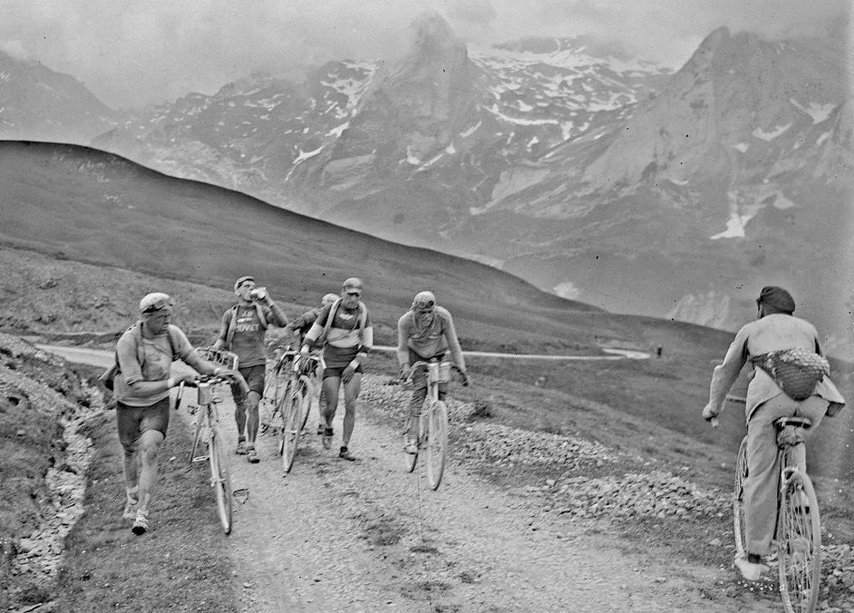 Five cyclists meet a local inhabitant in the mountains during the Tour de France in 1925