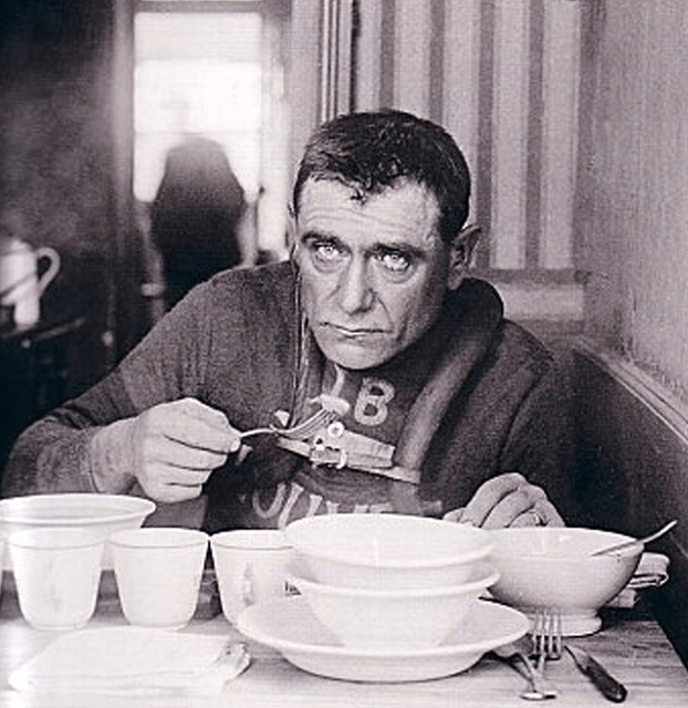 Face from the past: french cyclist Eugène Christophe eating his meal during a cycling race. 