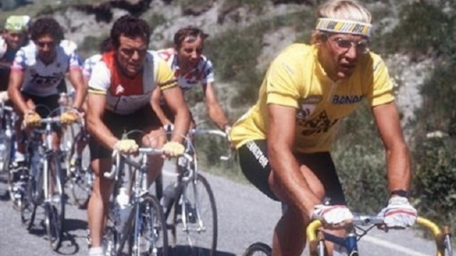 A moment from Tour de France 1984 with Bernard Hinault and Laurent Fignon, who wears the yellow jersey.