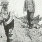 Emile Georget struggling through the snowy and unpaved roads in the Alps, possibly on Galibier during Tour de France 1911