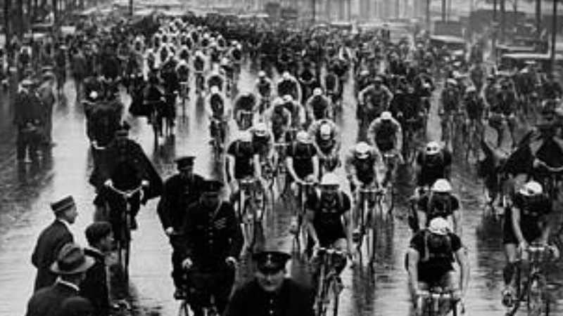 Part of the peloton as the cyclists rolling out from Paris during the first stage of Tour de France 1932